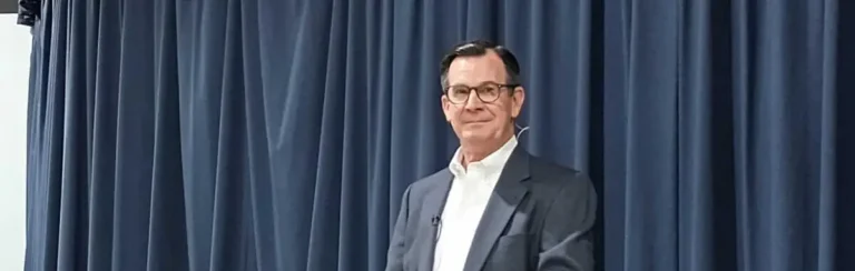 Herb Reavis speaks during a luncheon at the 2024 Alabama Baptist State Evangelism Conference.